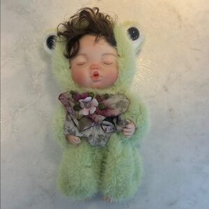 Baby Doll in Fuzzy Light Green Frog Outfit